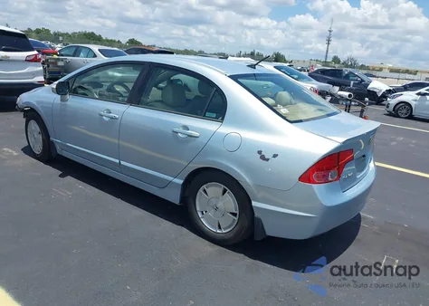 2006 Honda Civic Hybrid from USA, damaged, VIN JHMFA36296S010233